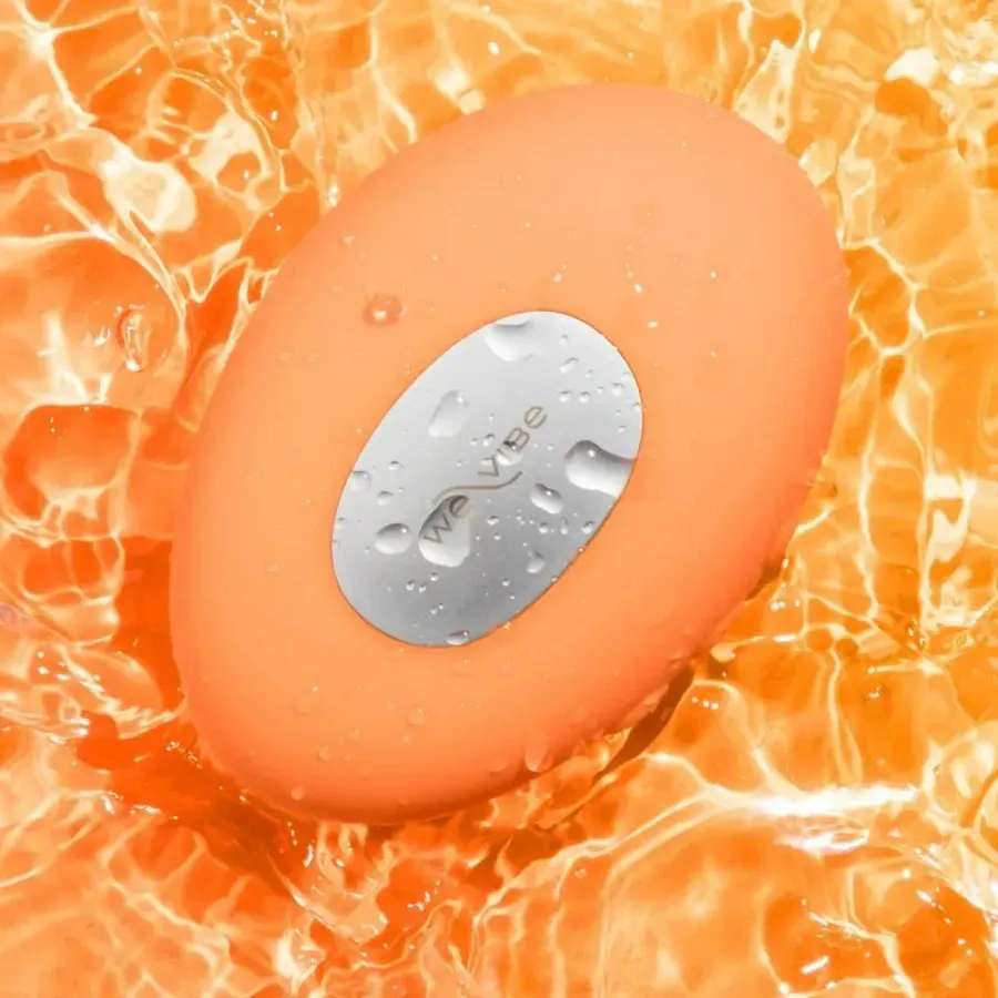Кліторальний вібратор We-Vibe Temp Tangerine з функцією нагрівання та охолодження, помаранчевий.