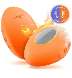 Кліторальний вібратор We-Vibe Temp Tangerine з функцією нагрівання та охолодження, помаранчевий.
