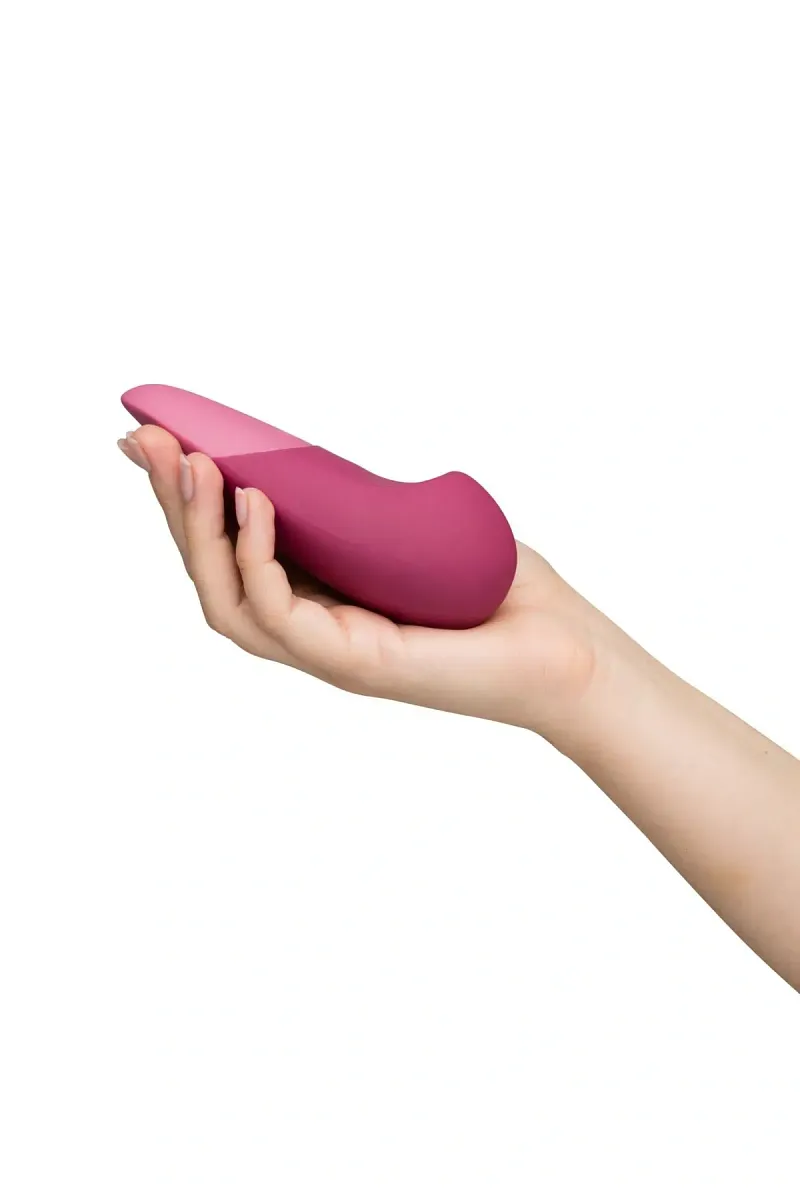 Універсальний безшумний вібратор Womanizer Vibe Dusky, рожевий.