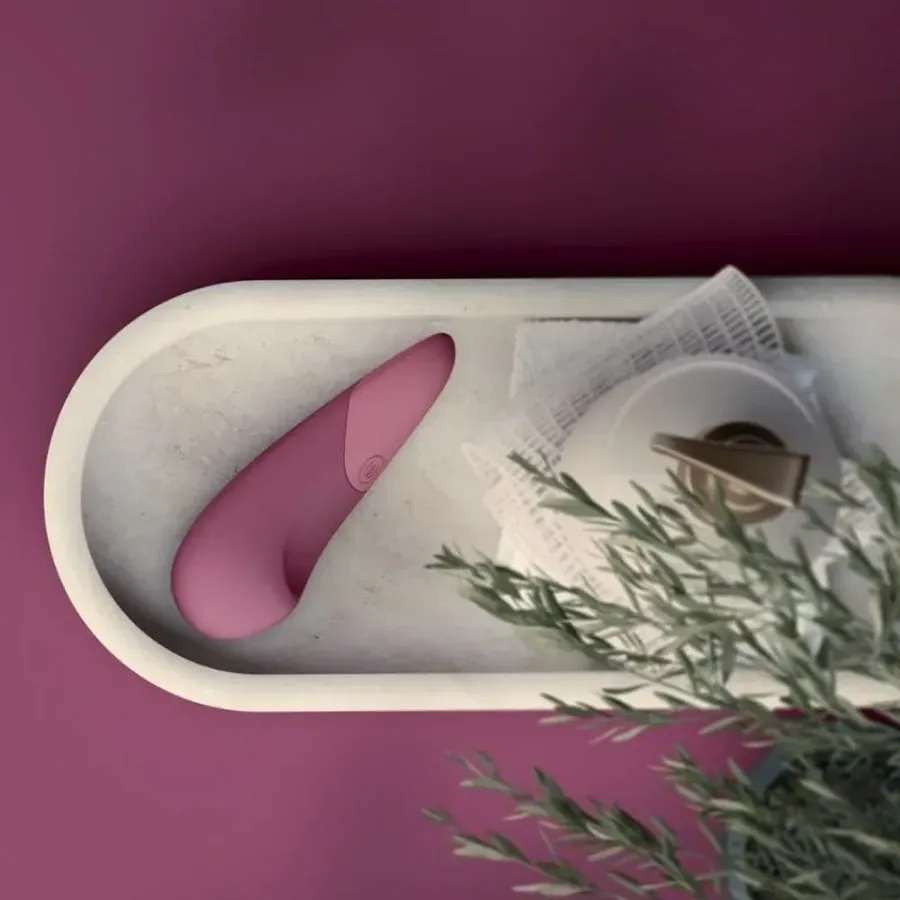 Універсальний безшумний вібратор Womanizer Vibe Dusky, рожевий.