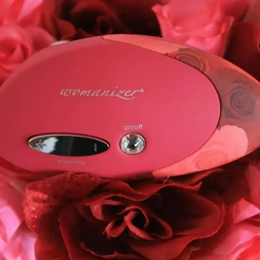 Кліторальний стимулятор Womanizer Pro W-500, червоно-рожевий.