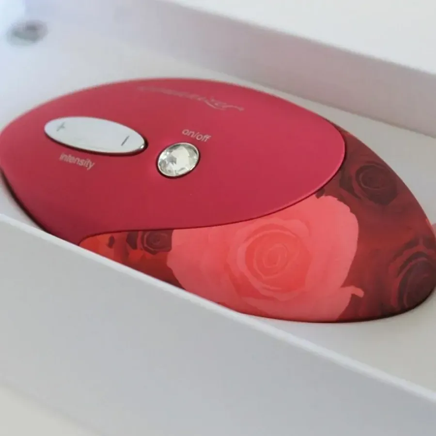 Кліторальний стимулятор Womanizer Pro W-500, червоно-рожевий.