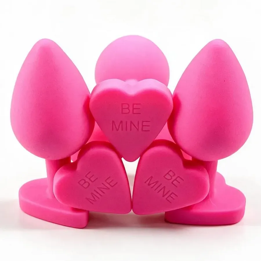 Силіконова анальна пробка ALUME BE MINE, розмір M, рожева з основою у формі серця (упаковка — пакет).
