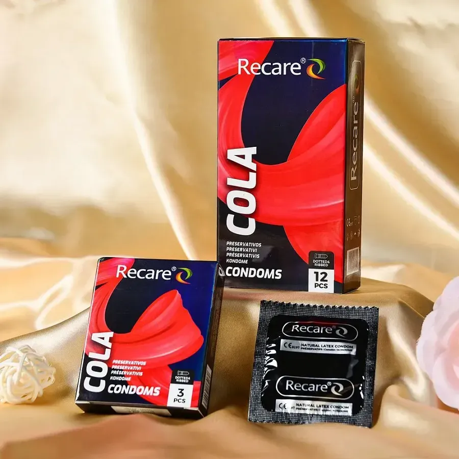 Презервативи Holographic Презервативи Holographic Recare Cola Dotted&Ribbed Condoms 12шт, з пухирцями і ребрами, аромат: Кола Cola Dotted&Ribbed Condoms 12шт, з пухирцями і ребрами, аромат: Кола